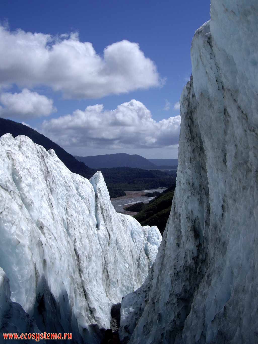 Ice cleft (crack) in the glacier body formed during melting process.
France Joseph Glacier, Westland National Park, West-coast region, South Island, New Zealand