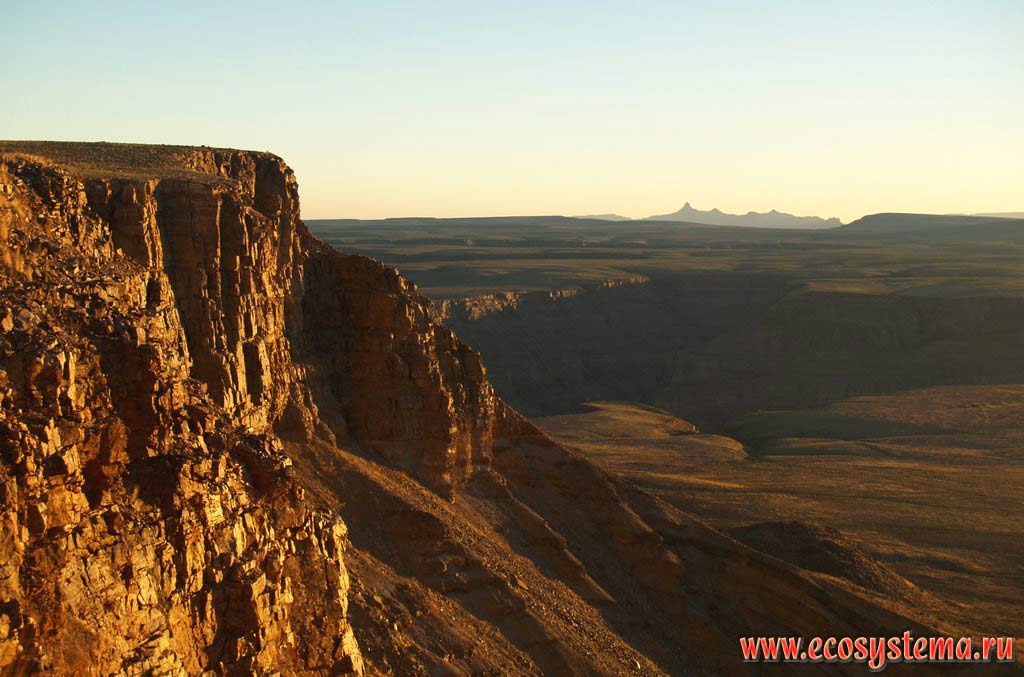 The Fish River Canyon wall at the sunset. Ai-Ais / Richterveld Transfrontier National Park, Southern Namibia, South African Plateau